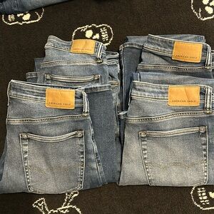 4 pair American Eagle Boot Cut Jeans